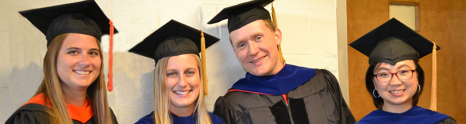 graduate students on graduation day