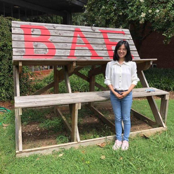 Xiang in front of BAE bench.