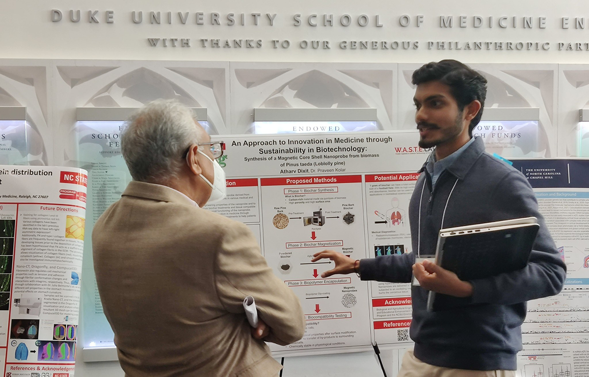 Atharv Dixit presents undergraduate research.
